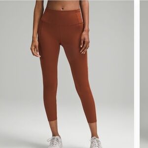 Fast and free high rise crop 23”